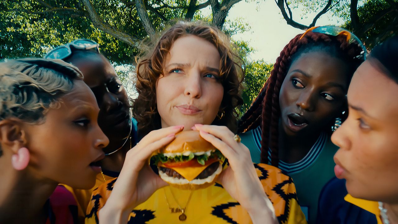 Friends gathered around a burger in the Hellmann’s campaign